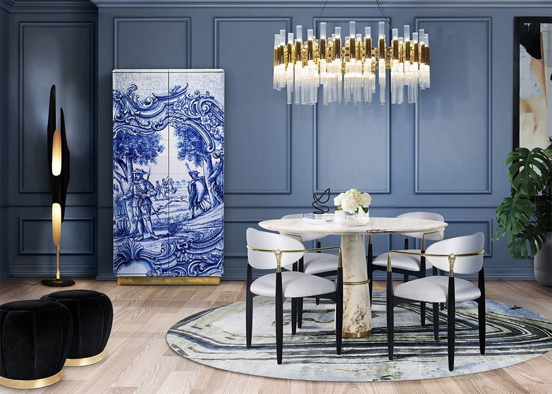 Modern dining room in blue tones and with round Agatha Rug
