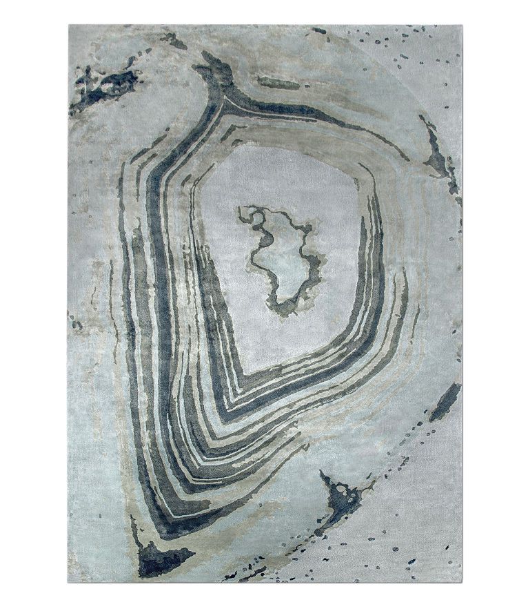 blue gray ish area rug with abstract pattern. MONIOMI Design - The Art Of Building Exquisite Homes