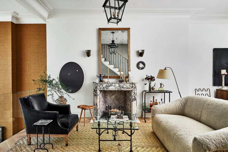 Jeremiah Brent, modern living room, contemporary furniture, yellow rug, marble fireplace
