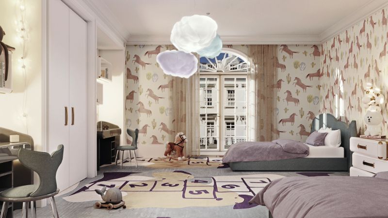 The Best Interior Design Rug For The Avalon Bedroom. Childern's bedroom with Mr Potato rug, cloud suspending lights and gray beds with mermaid chair.