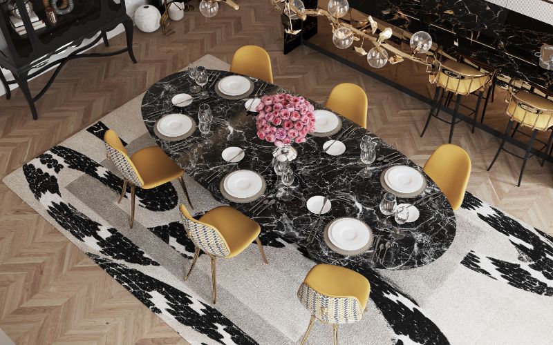Chic dining room with imperial snake rug and marbled dining table