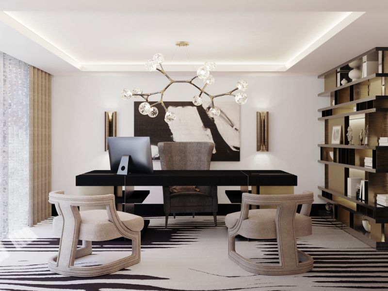 modern contemporary home office with the KOTTA RUG in black and white with comfortable armchairs and sleek black desk.