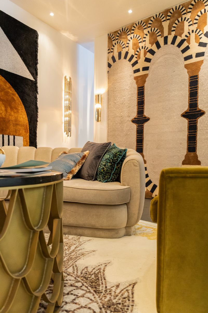 The Best of iSaloni 2022's Interior Design Trends, living room decor with round rug and wall rugs