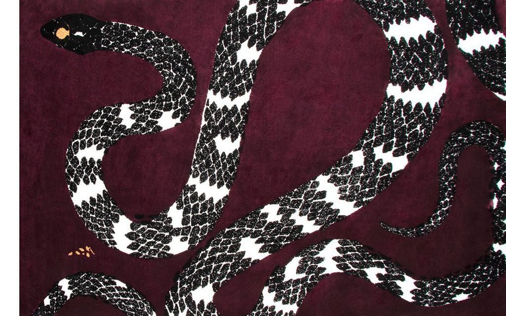 contemporary area rug in red with snake design. New Delhi Interior Designers With Incredible Project Inspirations