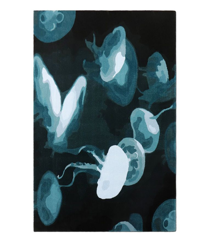 Modern Rug Inspiration: area rug in tones of blue with medusa design