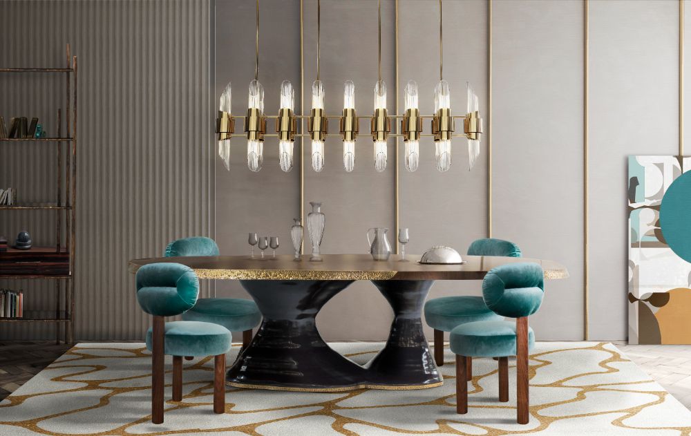 luxurious modern dining room with Cell Rug. Black and gold dining table and blue dining chairs