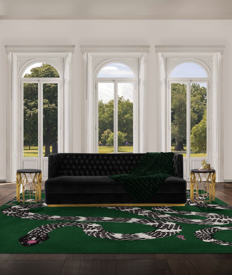 Contemporary living room with green snake rug and bourbon velvet sofa with 2 koi side tables.