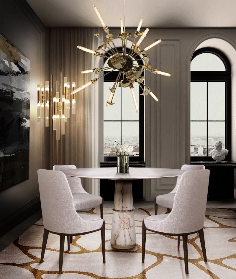 Modern classic dining room with Cell rug, agra round dining table, supernova suspension lights and white dining chairs