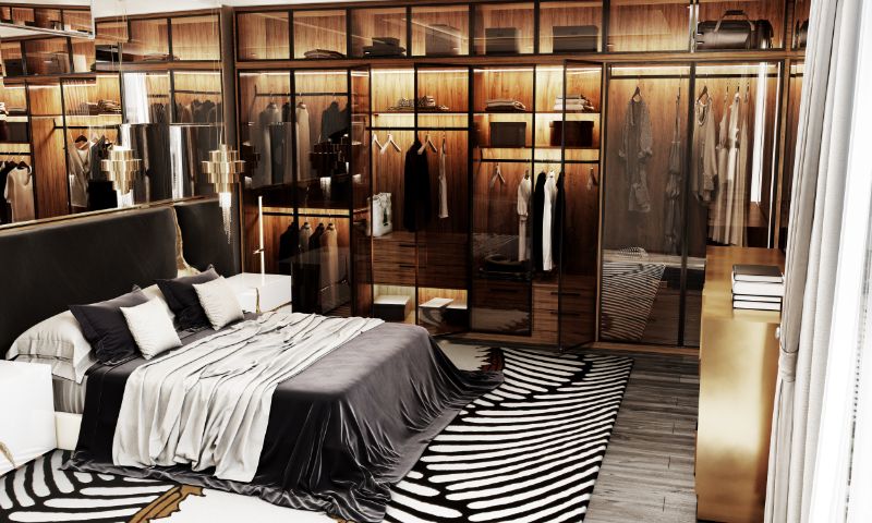modern master bedroom with black and white area rug with a bird design and stripes.