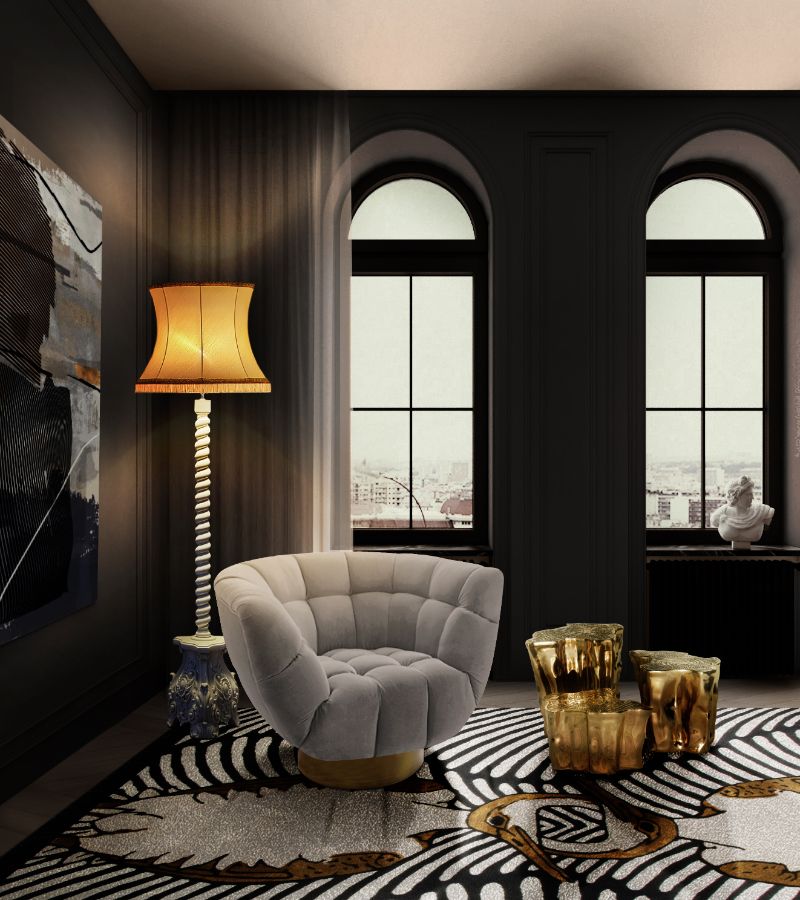 ISaloni 2022: New Furniture and Design Ideas. Modern contemporary living room with exclusive black and white rug with brown hues and a comfortable armchair and golden sidetable and standing lamp.