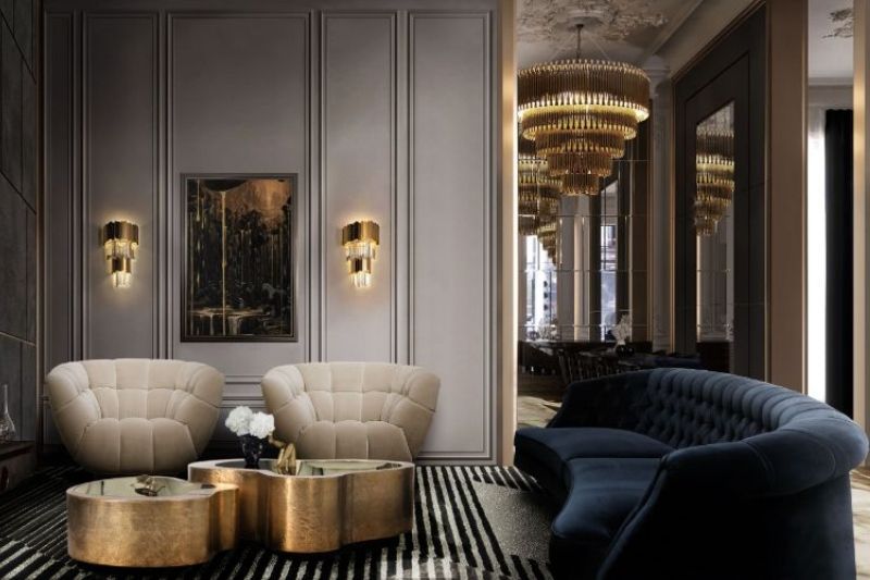 This modern contemporary living room is a real statement of luxury. The gray area AIR RUG creates a soft and warm ambiance while the MATHENY CHANDELIER It has a geometric design of connected tubes and brass that pair nicely with the rug. All of these elements are handcrafted by the best Portuguese craftsmen. luxurious interior design