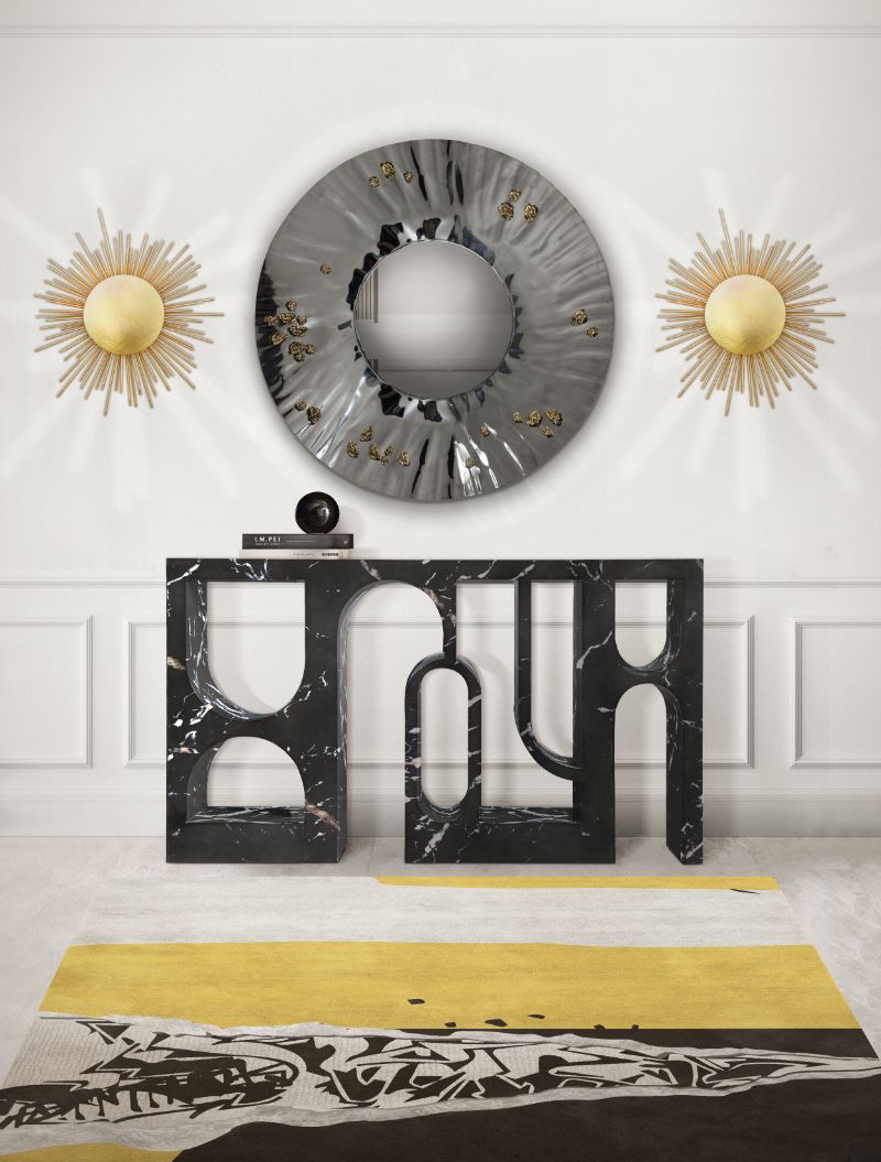 Runner Rugs For Hallways With An Elegant Flair. Contemporary hallway with black and yellow rug and faux-marbled console and gray mirror and golden wall lighting.