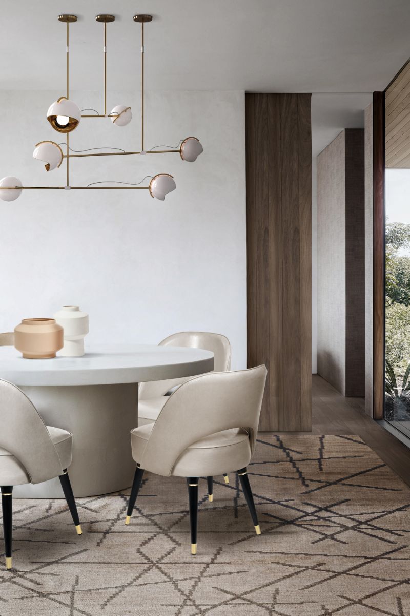 Vintage and classic dining room with neutral area rug and dining chairs