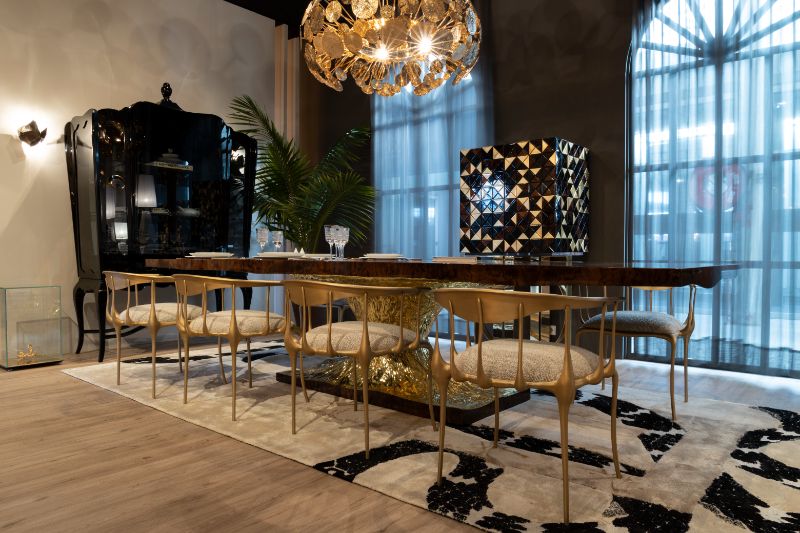 Interior Design Trends For 2023 With New Trend Rooms Ebook. Opulent dining room with golden chairs and suspension lights and neutral rug